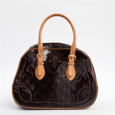 louis vuitton shiny leather bag.